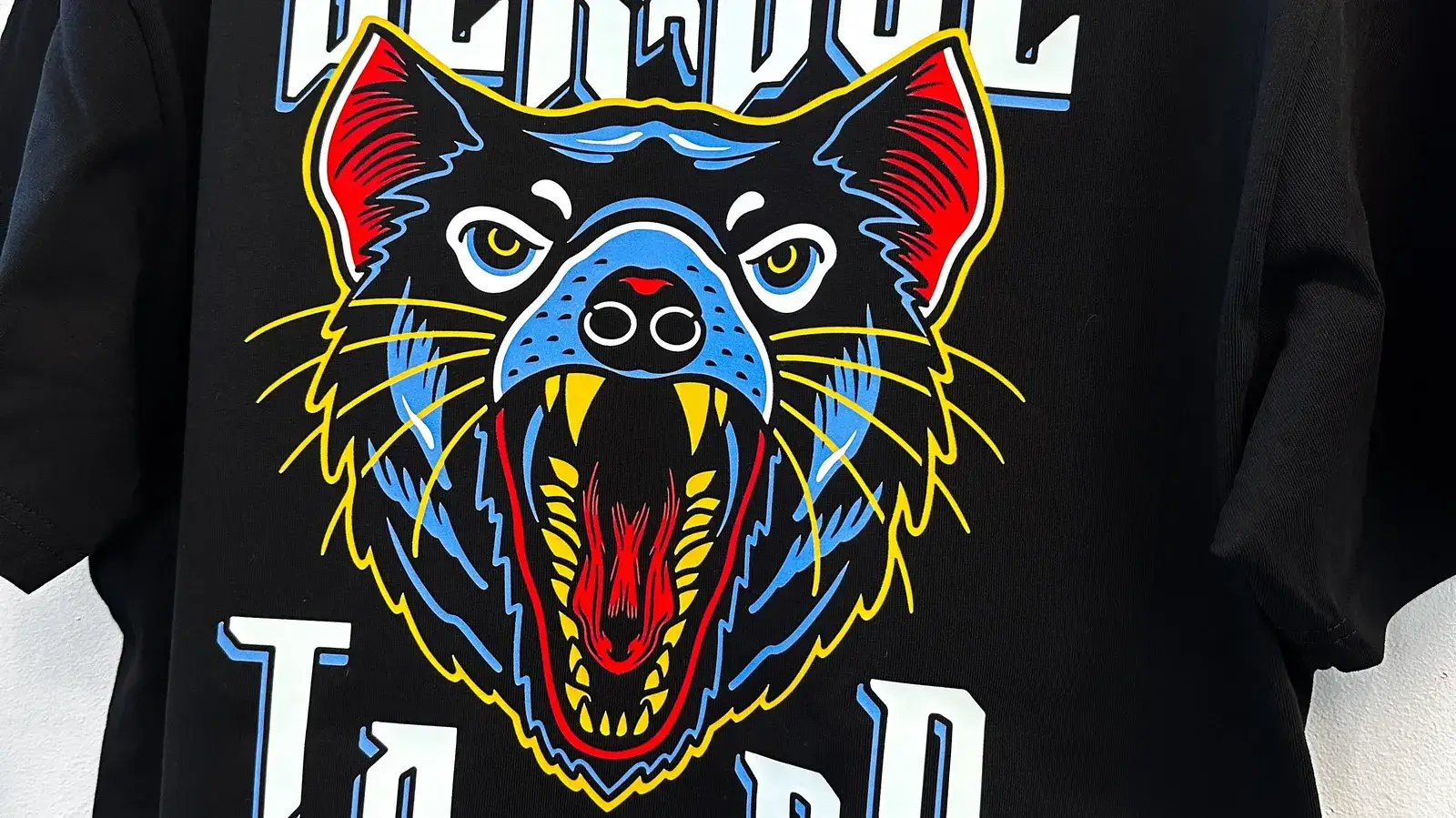 Black Devil Tattoo vibrant graphic print on back of black t-shirt