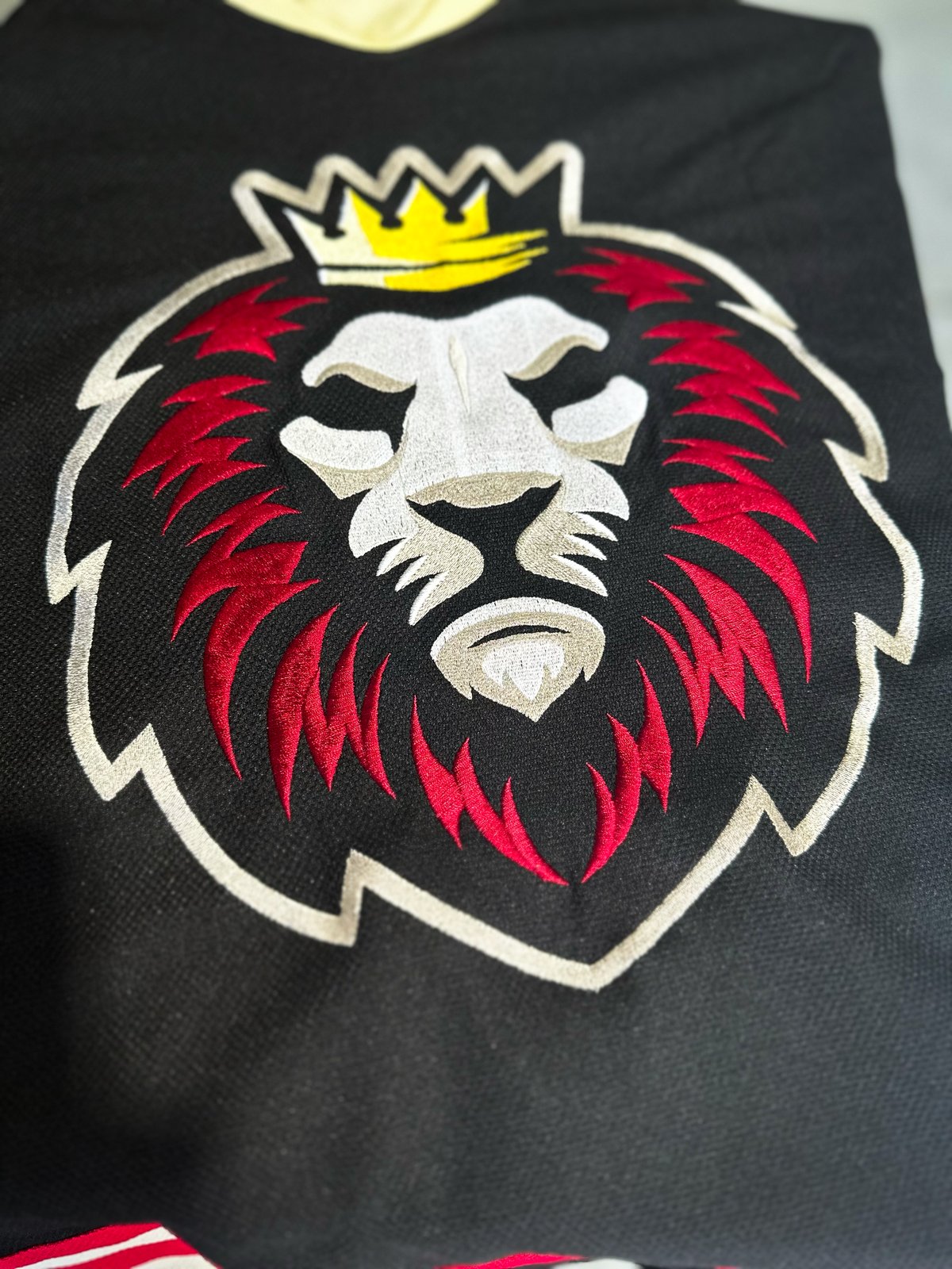 Saints Monarchs embroidery by Melbourne Merch - Outstanding showcase of embroidery texture and quality with a tight, professional composition