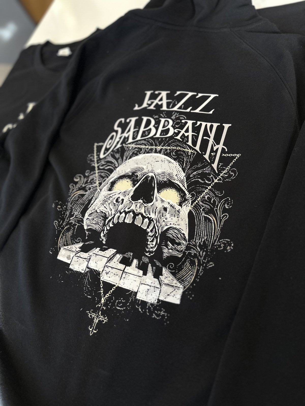 Your Mate Bookings Jazz Sabbath dtf print by Melbourne Merch - Moody lighting, professional angled composition, crisp print with great depth of field