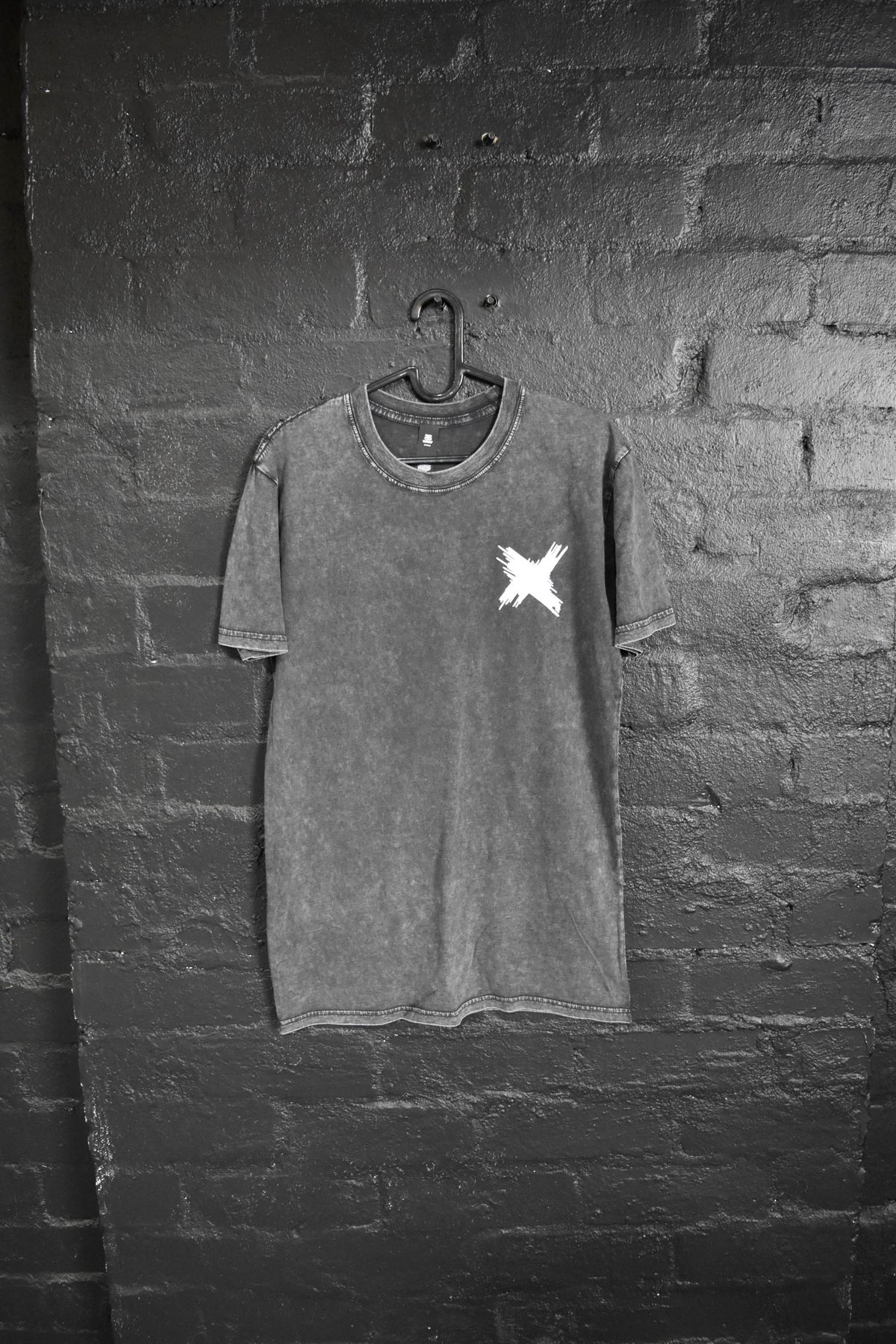Custom screen print by Melbourne Merch - strong moody composition on textured black brick, crisp decoration, very professional look