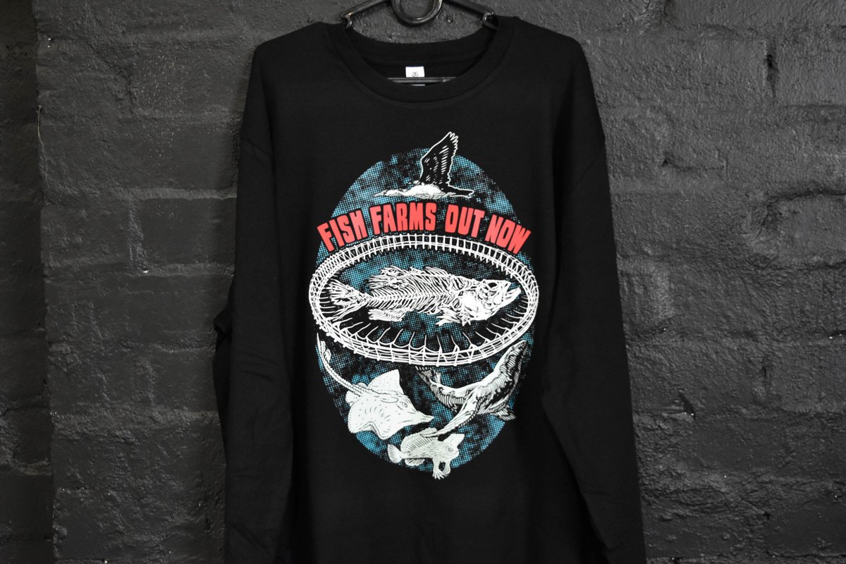 Custom screen print by Melbourne Merch - Crisp print, moody professional lighting against dark brick, strong brand visibility