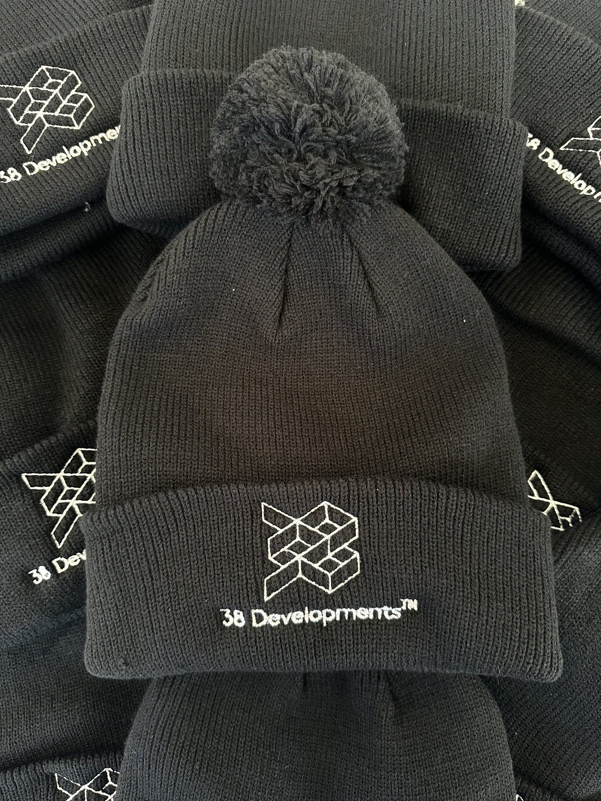 38 Developments embroidered caps by Melbourne Merch - Piled composition adds depth, crisp embroidery detail, brand reads cleanly