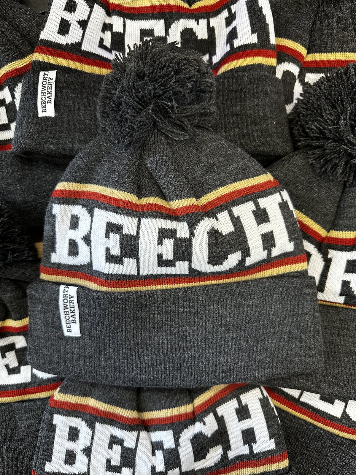 Beechworth Bakery Beanies embroidered caps by Melbourne Merch - crisp engraving, strong professional composition with nice depth of field