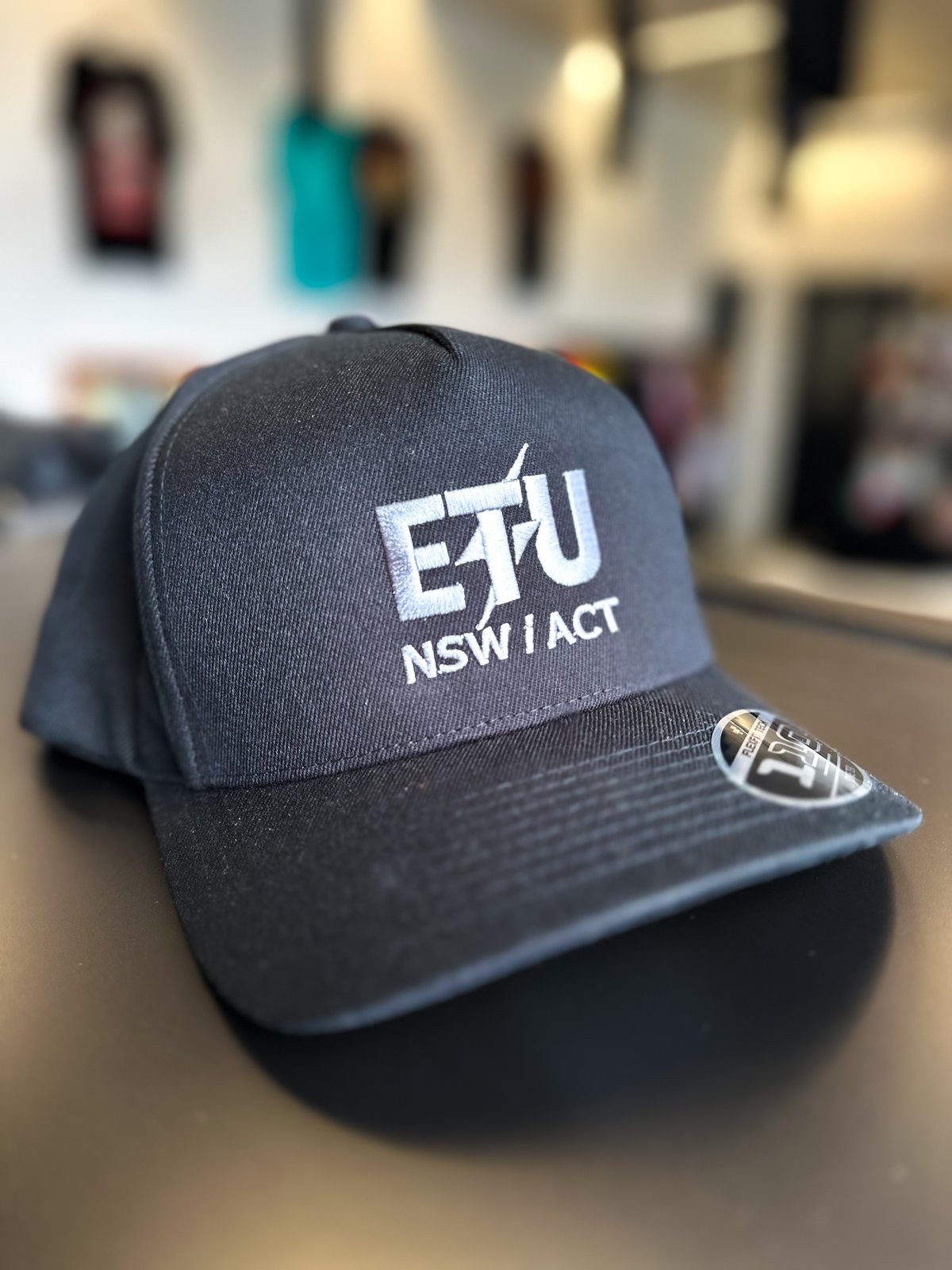 ETU dtf print by Melbourne Merch - sharp decoration focus, professional depth of field, clear brand identity