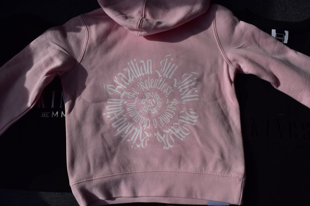 Custom screen print by Melbourne Merch - crisp print, moody and high contrast lighting, brand identity reads clearly