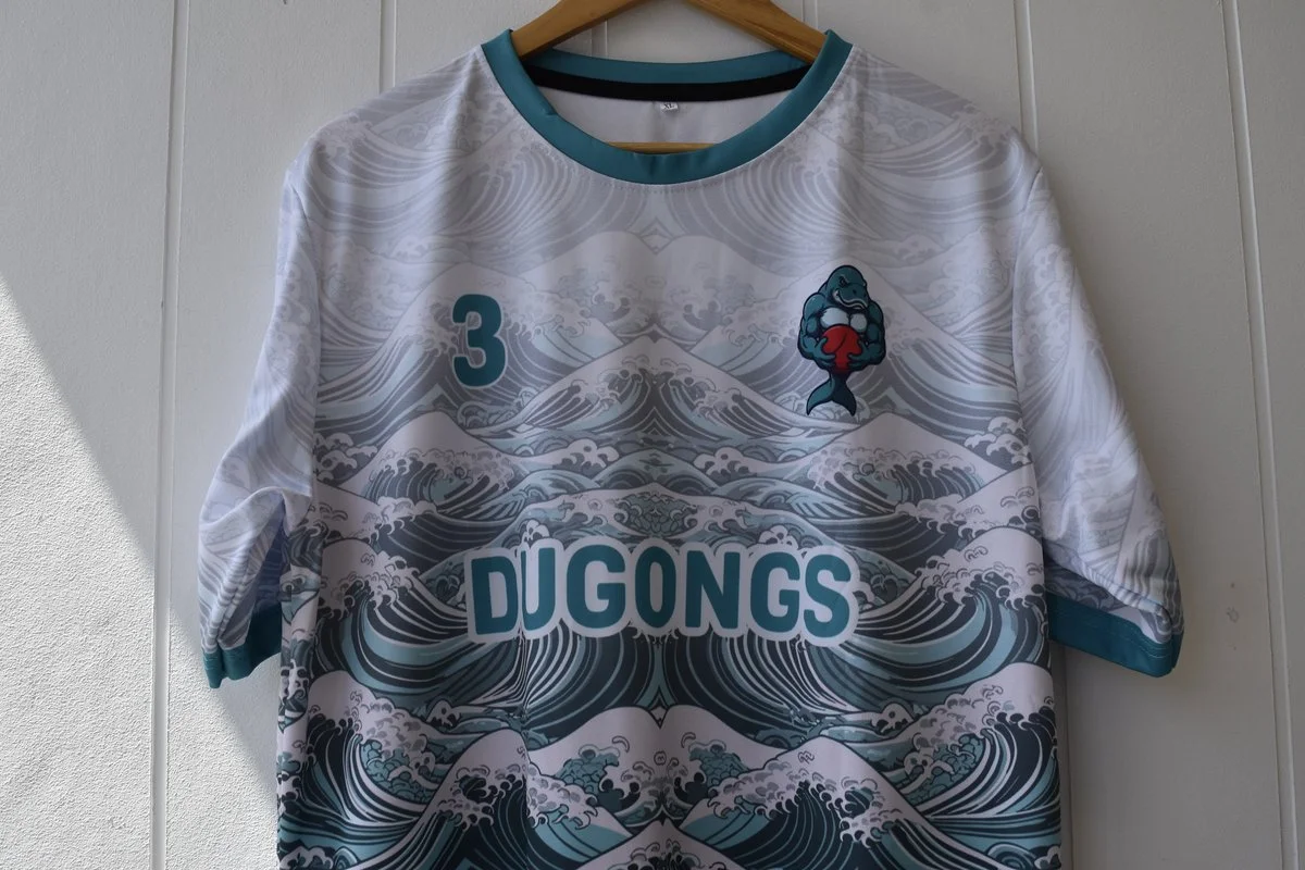 Dugongs sublimated jersey front with team branding and waves design