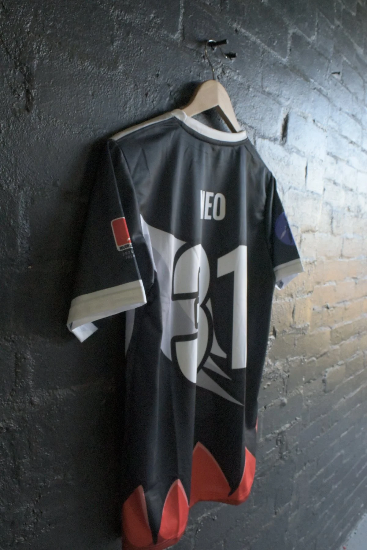 Neo number 31 sublimated jersey back with abstract red and black rocket design