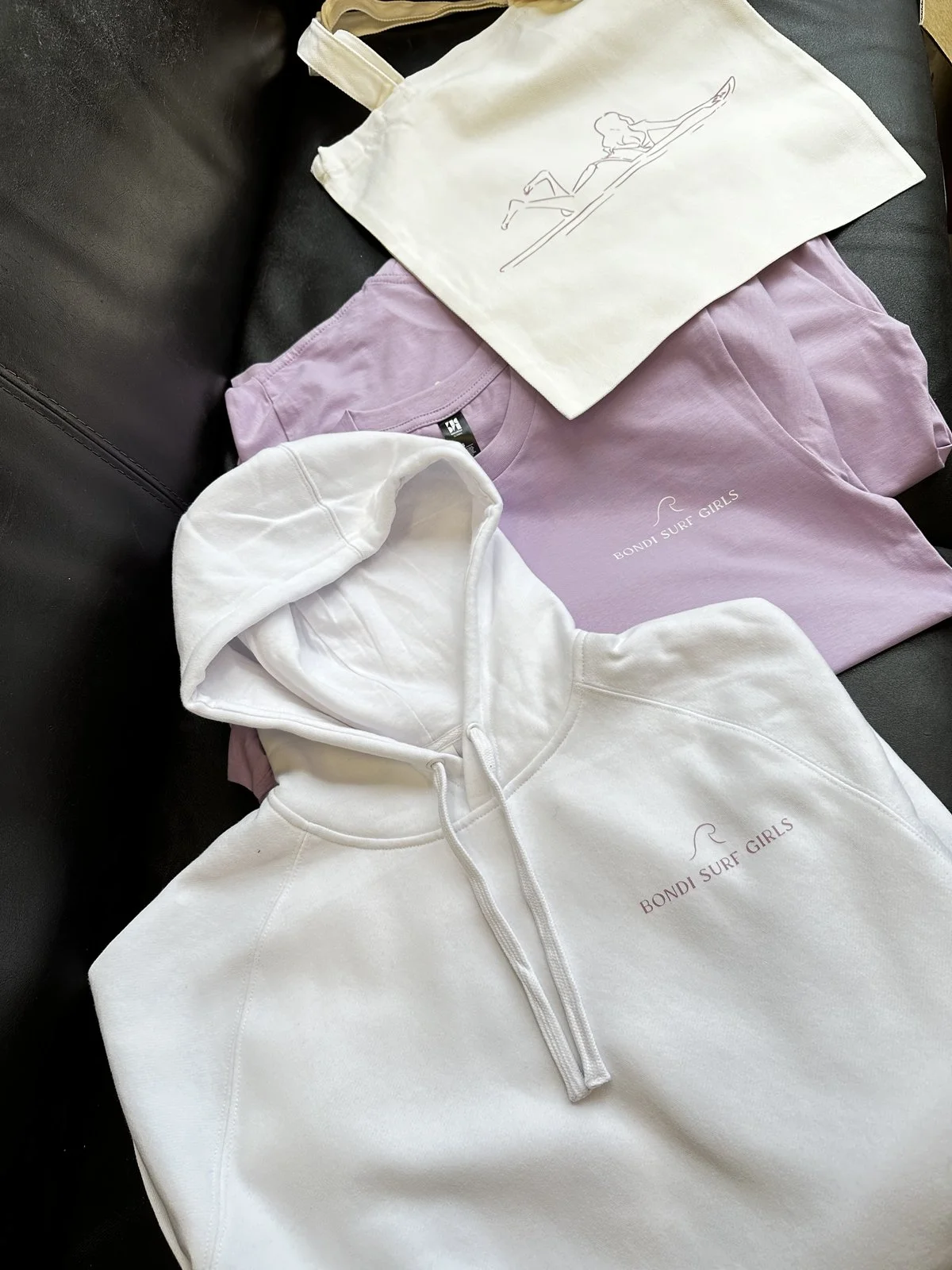 Bondi Surf Girls custom merch pack with apparel and branded packaging