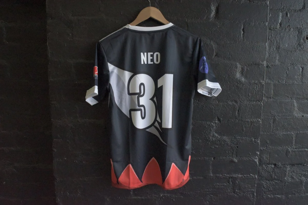 Neo sublimated jersey with abstract black and red rocket design