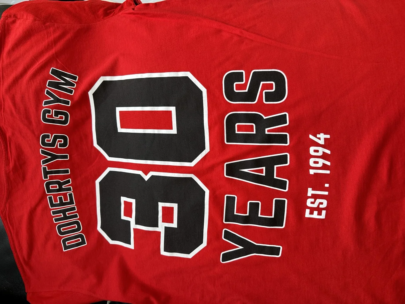 Doherty's Gym 30 years anniversary screen print on red tee